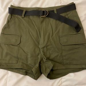 Green/olive shorts with black belt